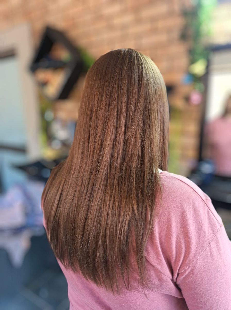 Long layered brunette cut with a smooth finish