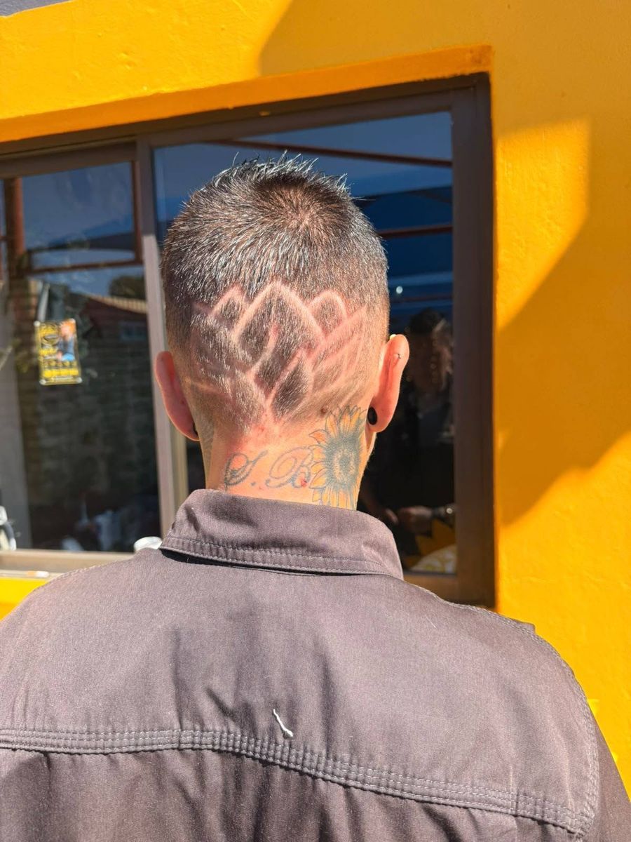 Detailed patterned clipper cut created at Lynne’s Hair Studio