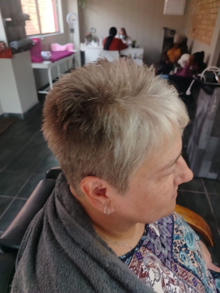 Textured short pixie cut created at Lynne’s Hair Studio